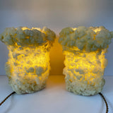 A pair of mid-century wax lights, very unusual