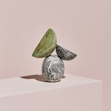 Slice by Vic Wright, sculpture with iron, ink and casting cement.